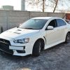 Mitsubishi Lancer Evo X - Lâmina frontal RACING V.1 | MI-LA-10-EVO-CNC-FD1A | Produto Maxton Design distribuído por Unicartuning. Mitsubishi Lancer Evo X - Lâmina frontal RACING V.1 | MI-LA-10-EVO-CNC-FD1A | Produto Maxton Design distribuído por Unicartuning.