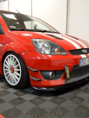 Ford Fiesta ST Mk6 - Lâmina frontal V.1 | FO-FI-6-ST-FD1G | Produto Maxton Design distribuído por Unicartuning. Ford Fiesta ST Mk6 - Lâmina frontal V.1 | FO-FI-6-ST-FD1G | Produto Maxton Design distribuído por Unicartuning.